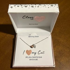 Sterling silver I <3 my cat necklace, clasp closing. New in original packaging.